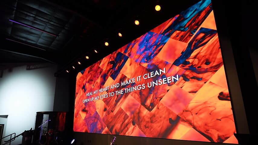 Church LED video wall lit with worship graphics