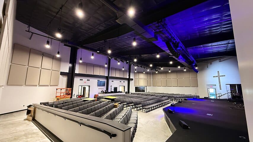 Finished church auditorium with new audio, video, and lighting